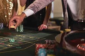 radja4d app home screen showing football odds, live-dealer tables, and slot game categories